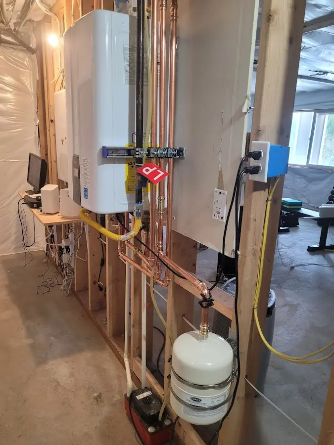 Licensed plumber repairing a kitchen sink in Mentor